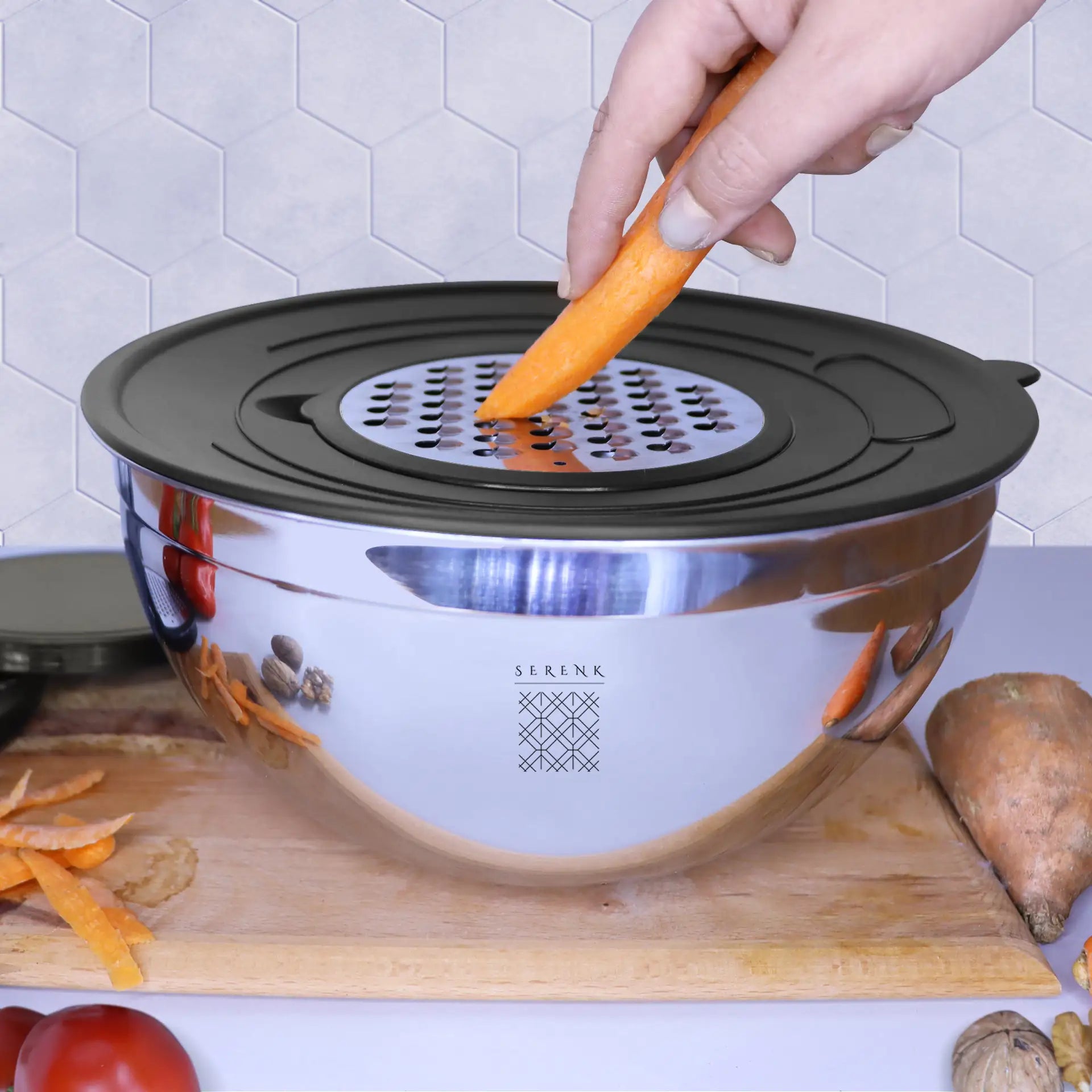 a person using a carrot slicer to slice carrots