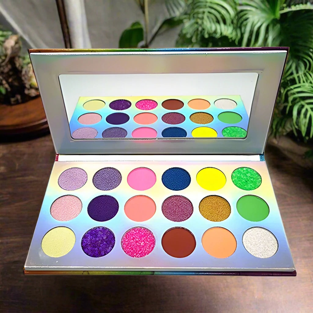 a close up of a makeup palette on a table