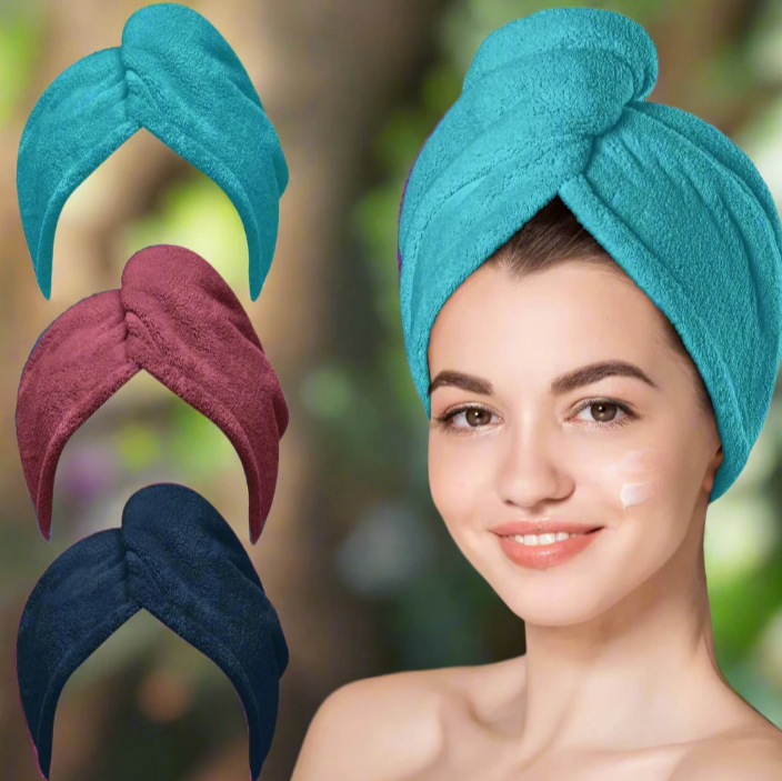 a woman with a towel wrapped around her head