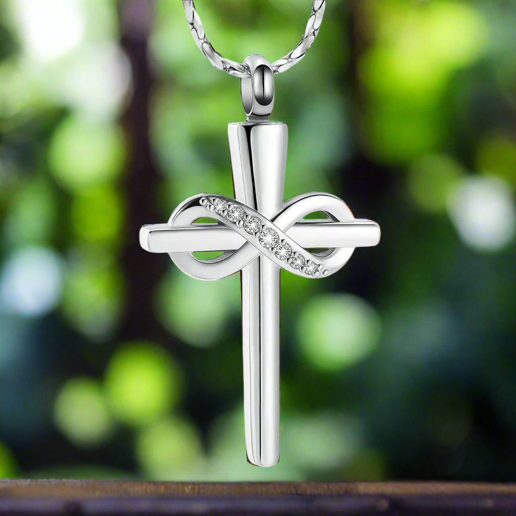 Imrsanl Infinity Love Cross Cremation Jewelry Ashes Religious Cross Urn Pendant Necklace for Women Men Pet Ashes Memorial Keepsake Jewelry in silver, showcasing a beautiful cross design symbolizing faith, hope, and infinity. This inspirational piece from Blooming Violets is perfect for pet owners and serves as a heartfelt memorial piece, merging religious beliefs with a sense of enduring love.