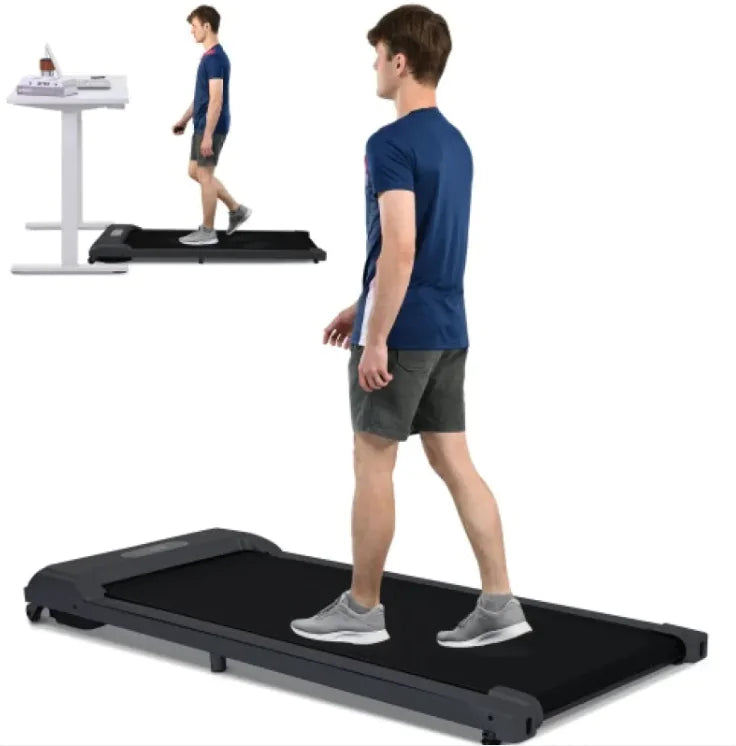 a man is walking on a treadmill