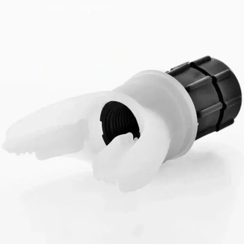 a black and white plastic bottle opener on a white background