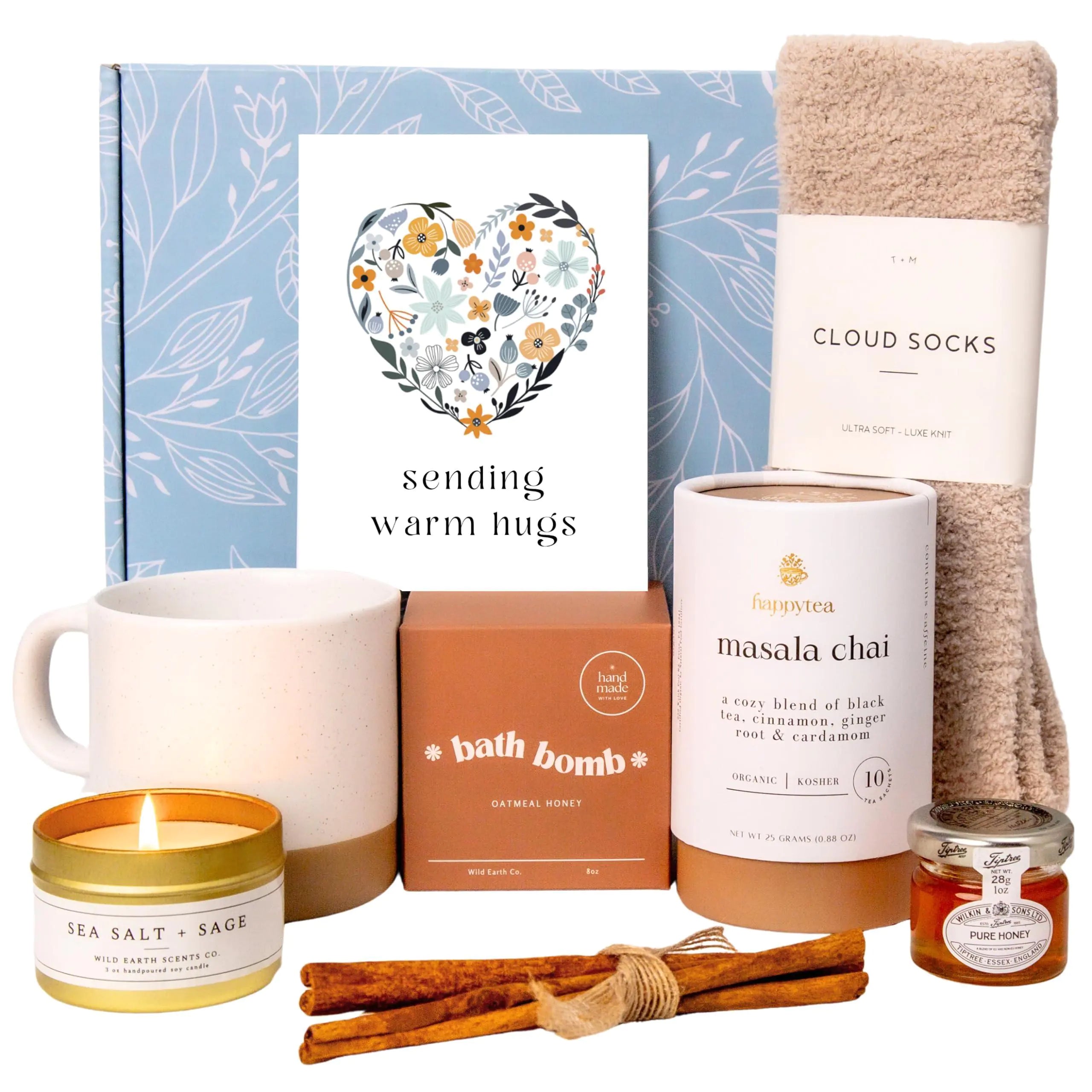 a candle, a candle holder, a towel, a candle, and some other