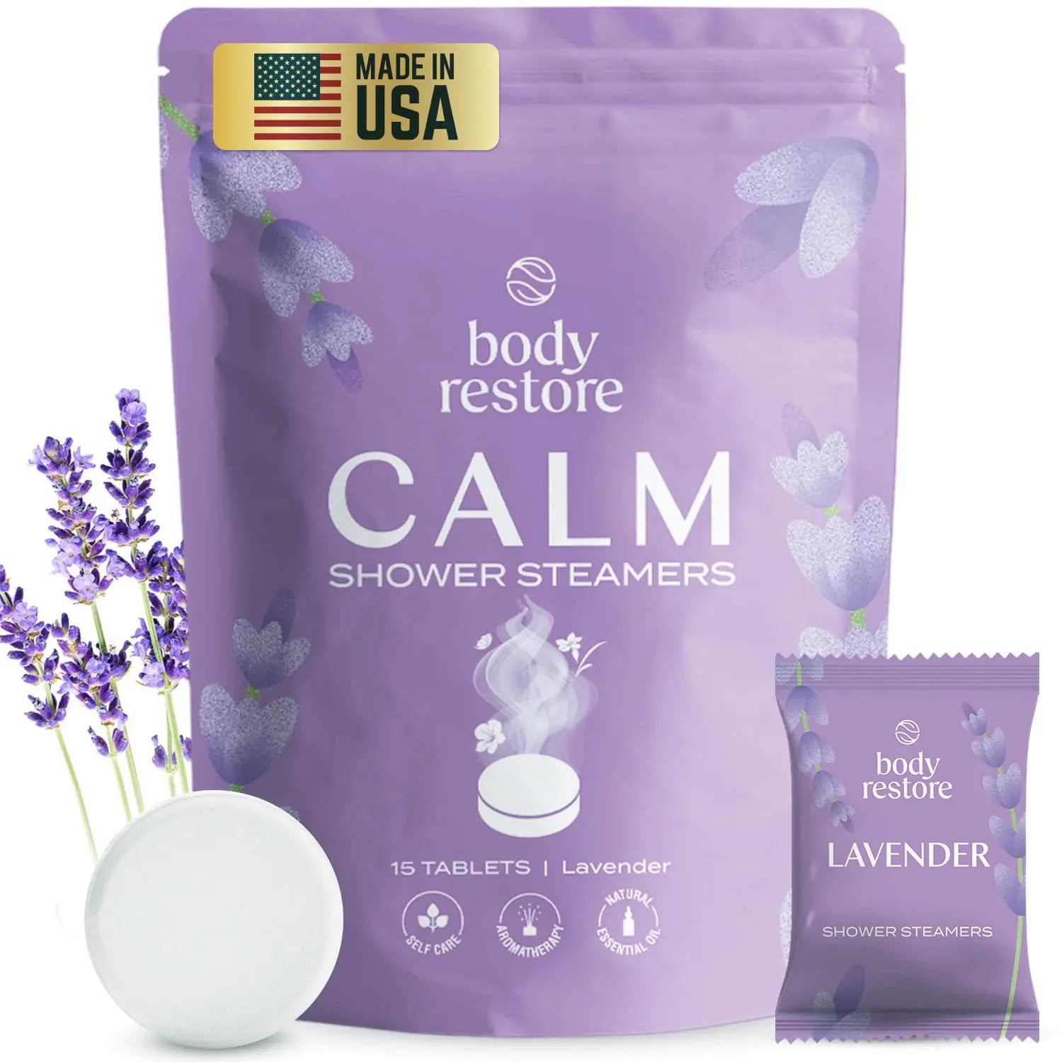 a bag of lavender tea next to lavender flowers