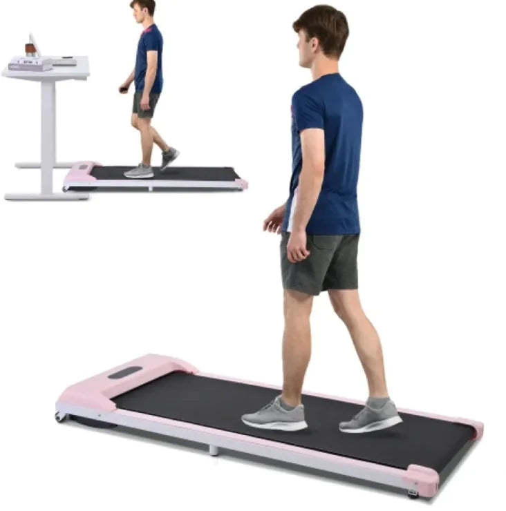 a man is walking on a treadmill