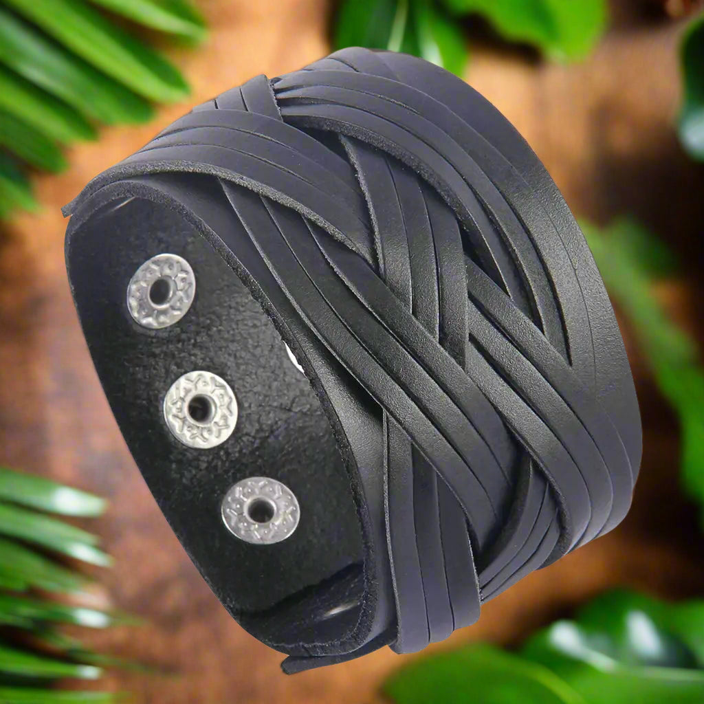 GelConnie Leather Cuff Bracelet in black, featuring a braided design. A perfect leather cuff bracelet for men and women by Blooming Violets, showcasing a goth style that blends fashion and religion, ideal for any occasion.