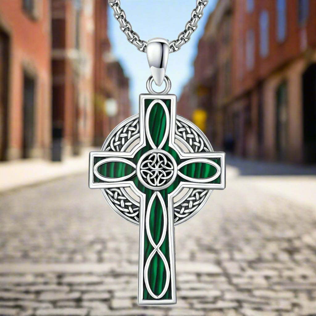 Stylish Midir&Etain Celtic Cross Necklace in 925 Sterling Silver, featuring a unique cross design in green hues, representing hope and protection. This stunning celtic cross necklace is a perfect gift for both gentlemen and ladies, embracing Irish and Catholic heritage. Visit Blooming Violets for this inspirational and religious jewelry piece.