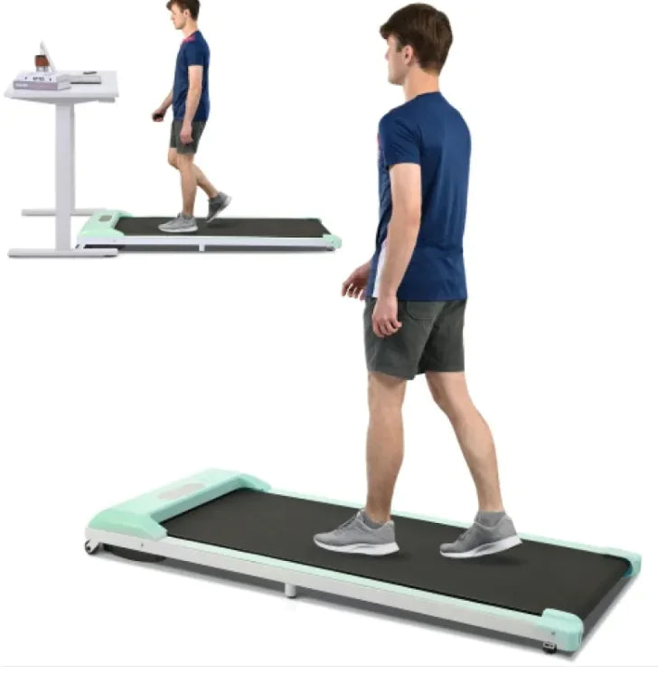 a man is walking on a treadmill