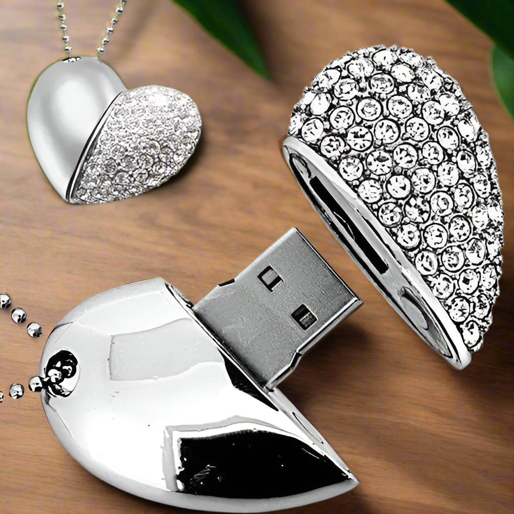 a usb device with a heart shaped cover on a table