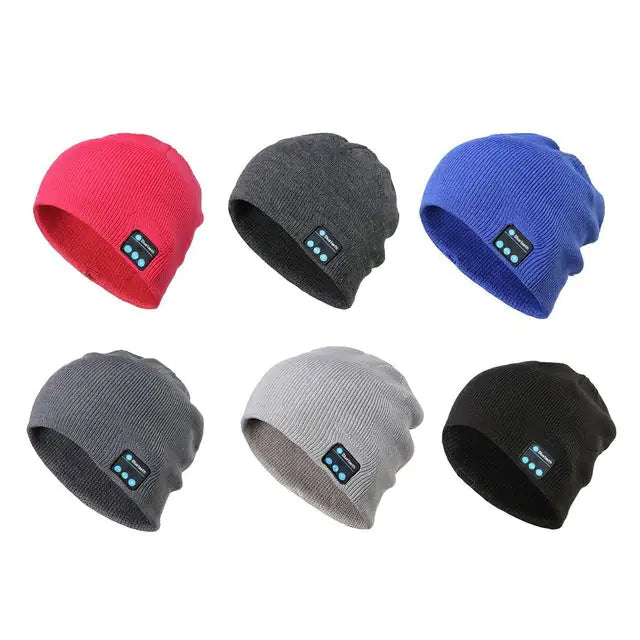 a set of four beanies with thermometers on them