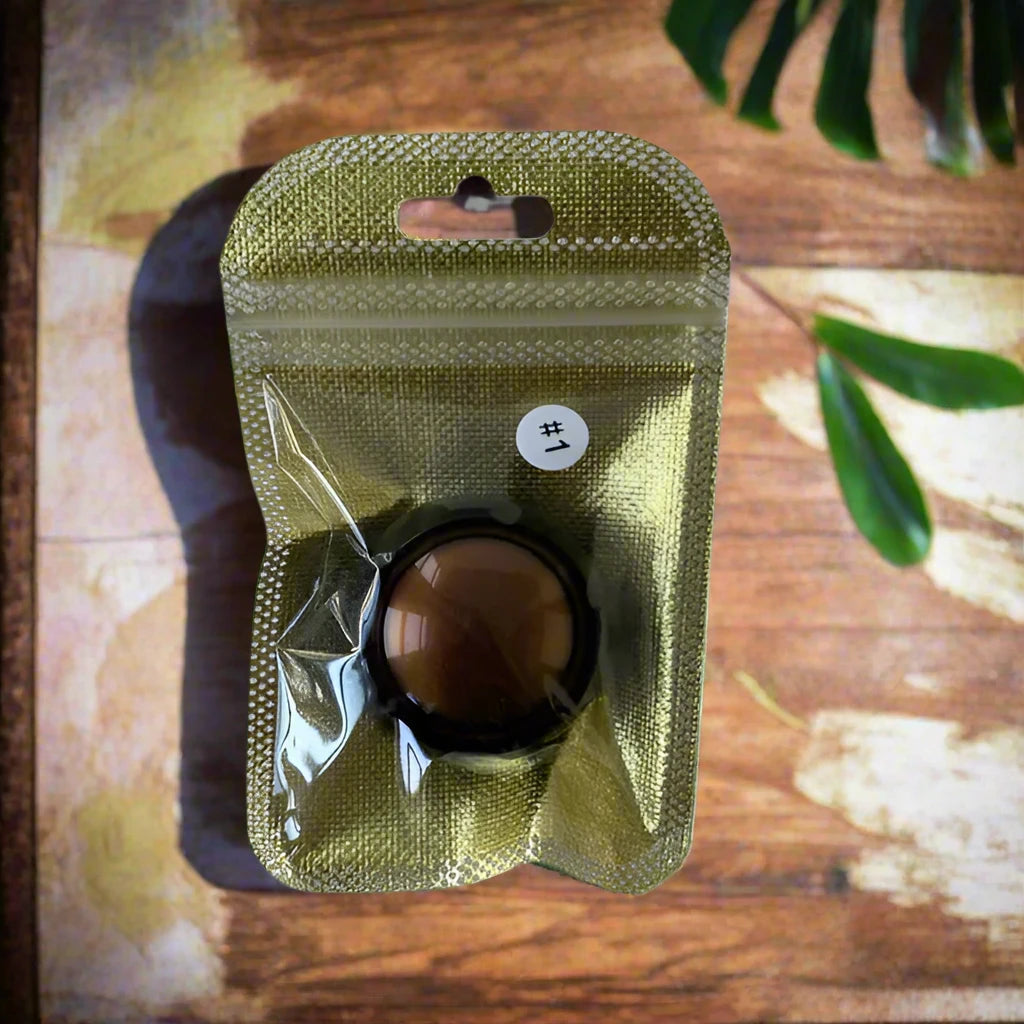 a package with a button on it sitting on a table