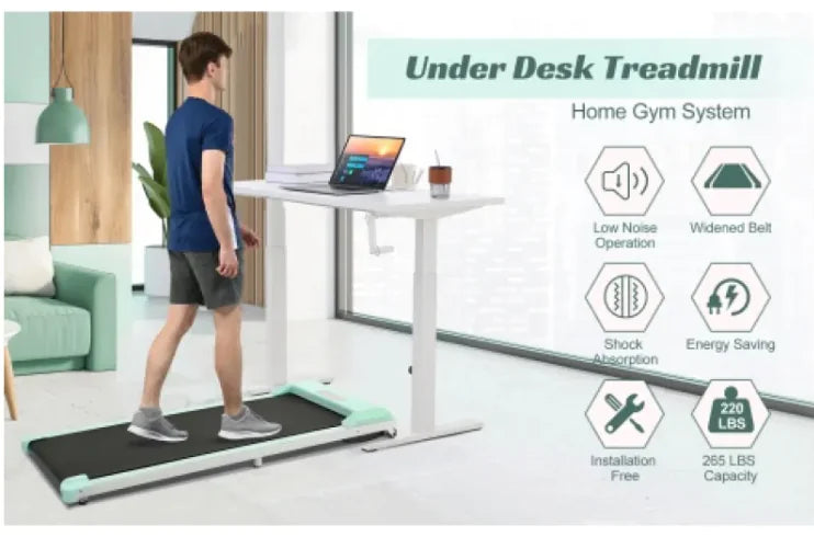 a man is walking on a treadmill