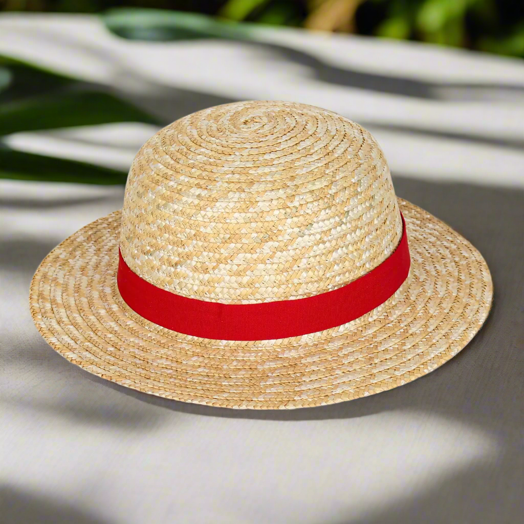 Charming straw hat for summer with a vibrant red band, a must-have accessory for fans of anime. This fashionable sun hat by Blooming Violets offers great style and comfort, making it perfect for women wanting to enjoy the warm weather. Enjoy free shipping on this delightful straw hat, popular in 2025 for spring outings.