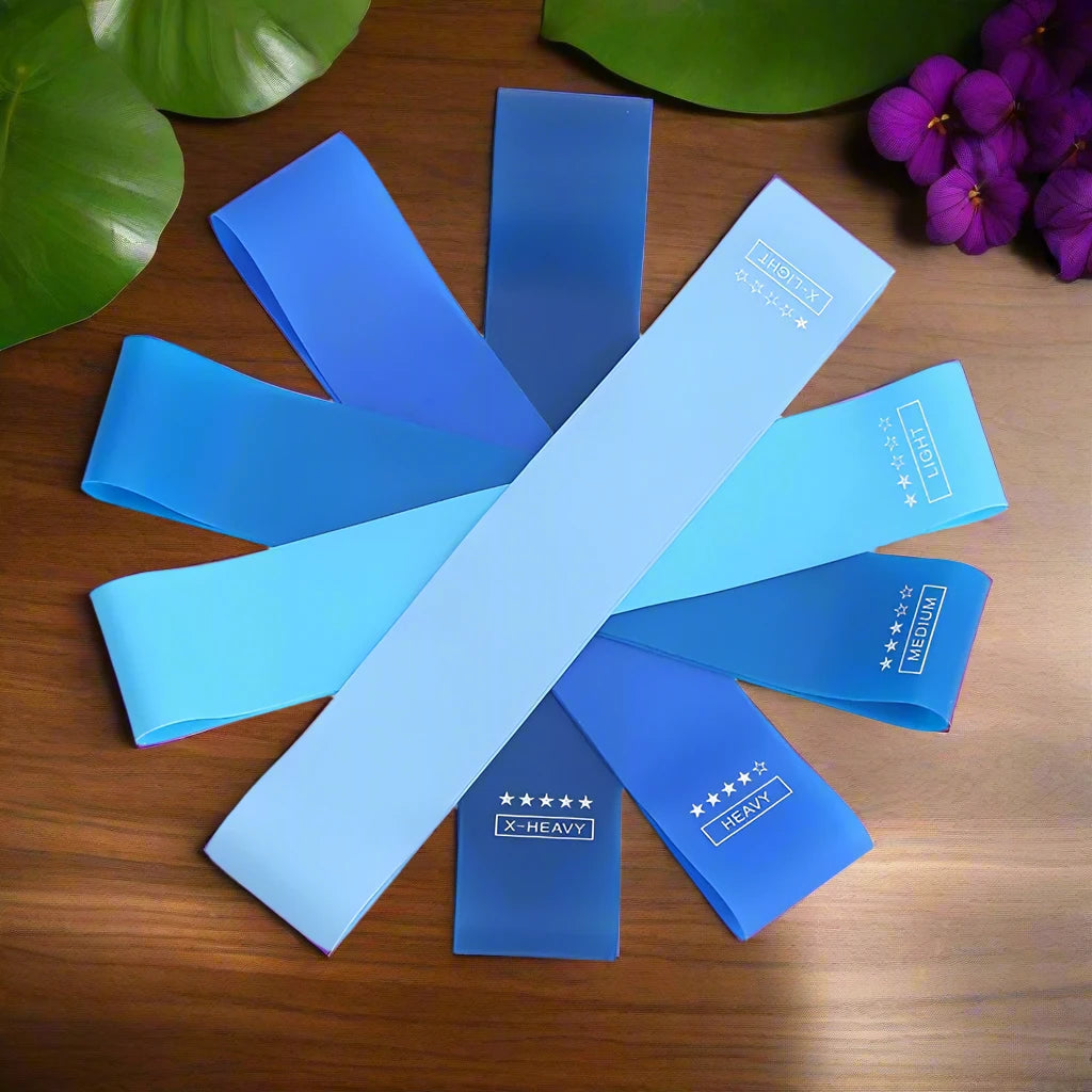 a group of blue pieces of paper on a table