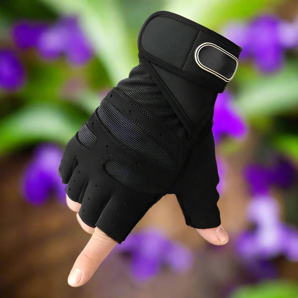 a hand wearing a black glove with a buckle on it