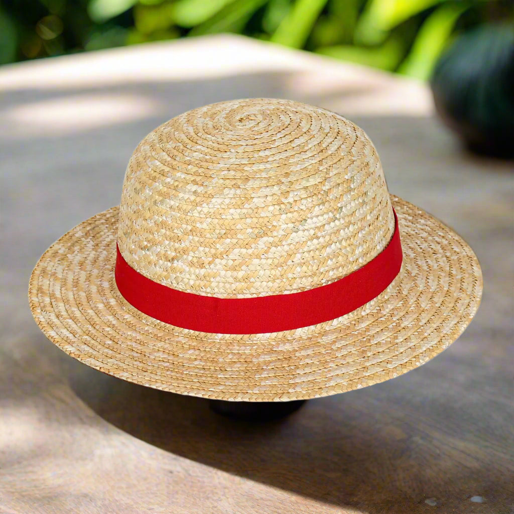 Stylish straw hat for summer featuring a red ribbon band, designed as an essential accessory for anime fans. Perfect for sunny days, this sun hat from Blooming Violets encapsulates fun summer vibes while providing free shipping. Ideal for ladies looking to enhance their fashion with a chic straw hat in 2025 during spring days.