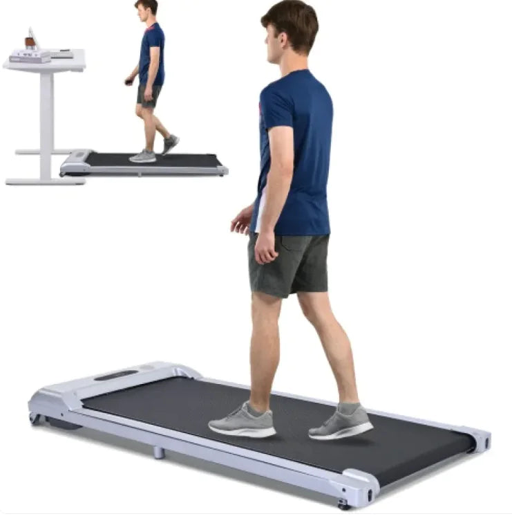a man is walking on a treadmill