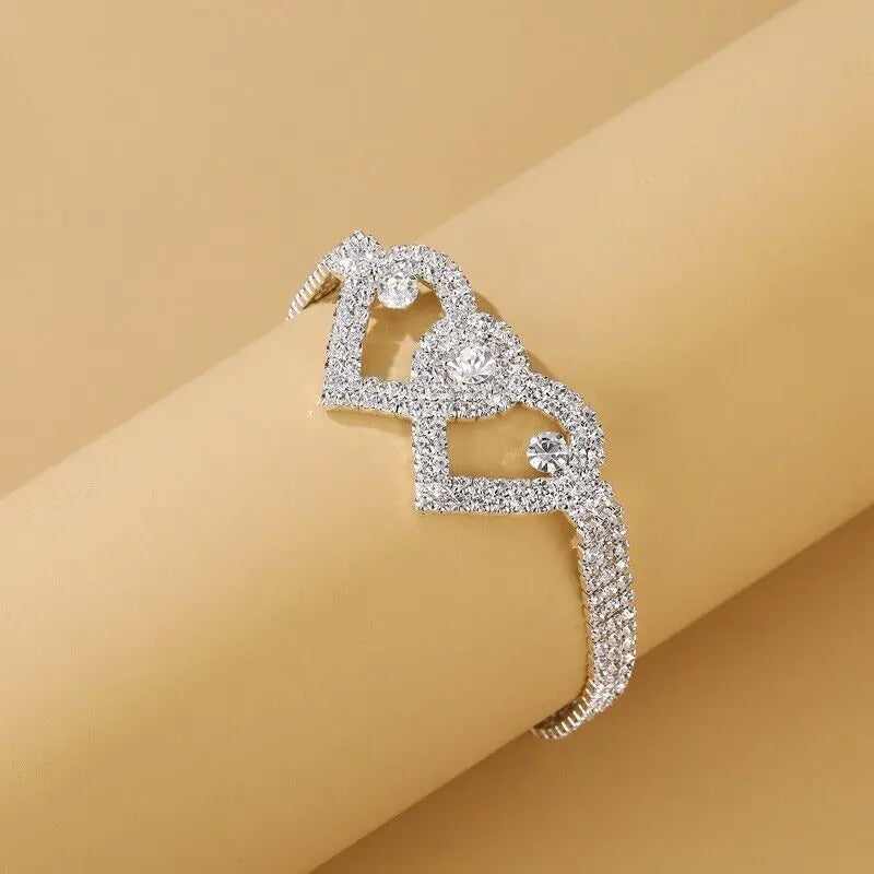 a diamond ring sitting on top of a piece of paper