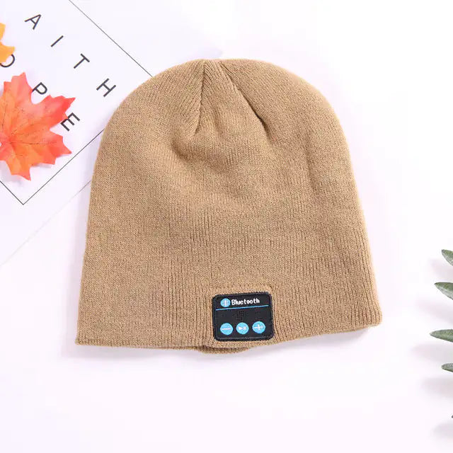 a beanie hat with a bluetooth button on it