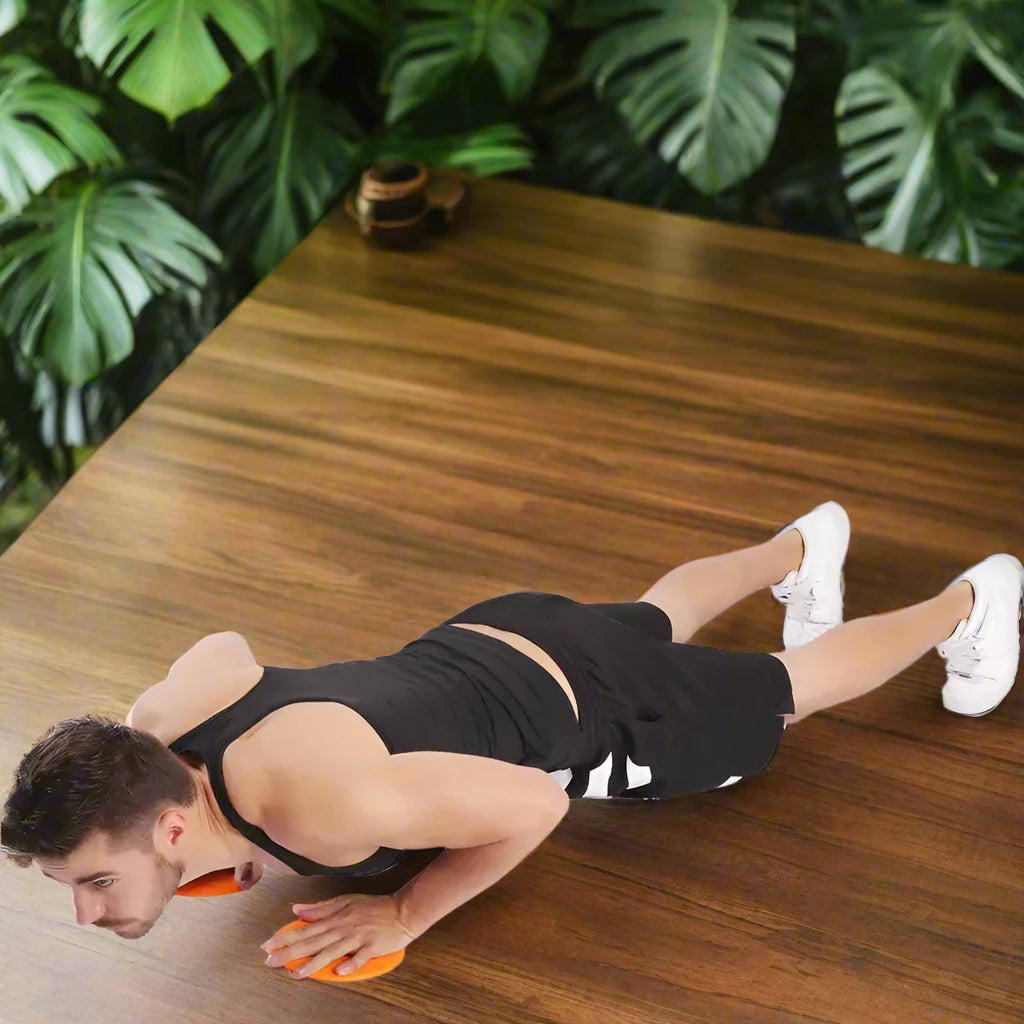 a man laying on the floor with a frisbee