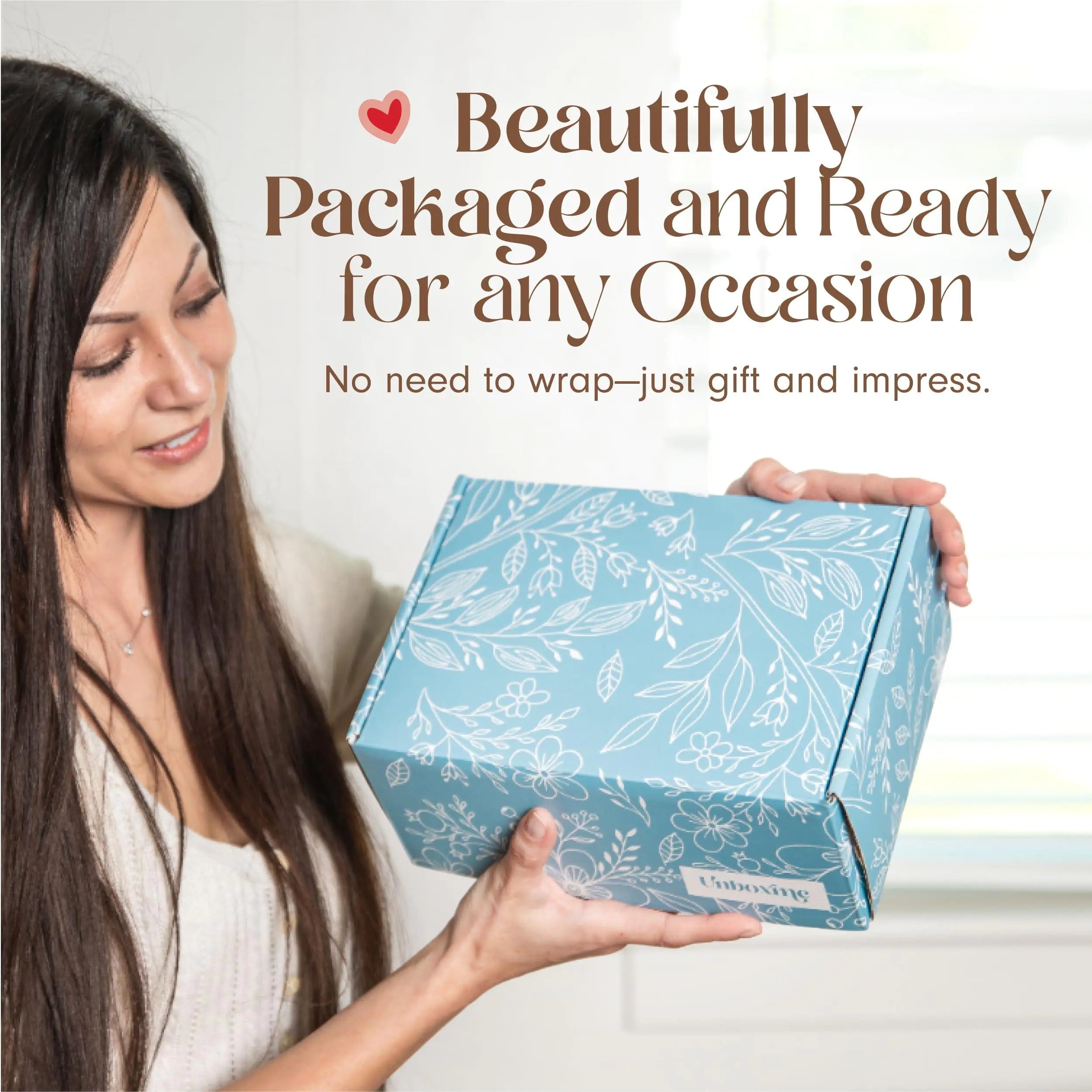 a woman holding a blue gift box with the words beautiful packaged and ready for any