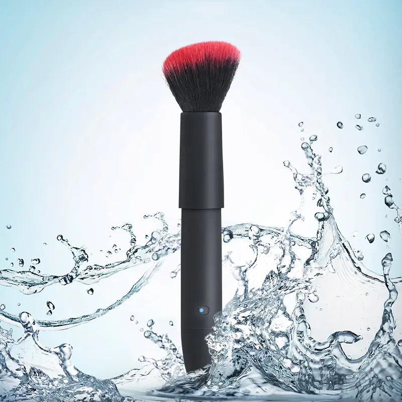a close up of a makeup brush in the water