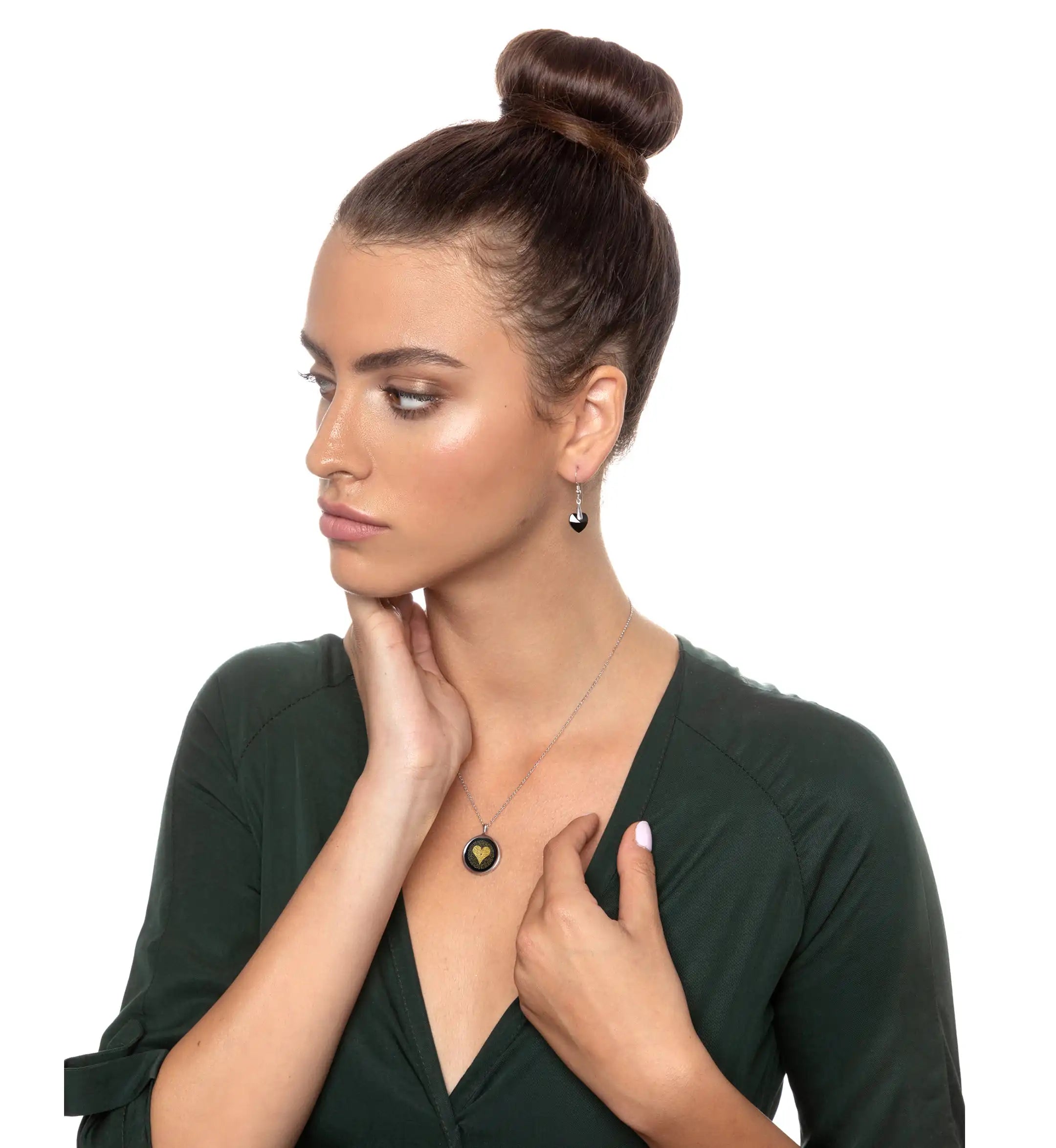 a woman with her hand on her chest