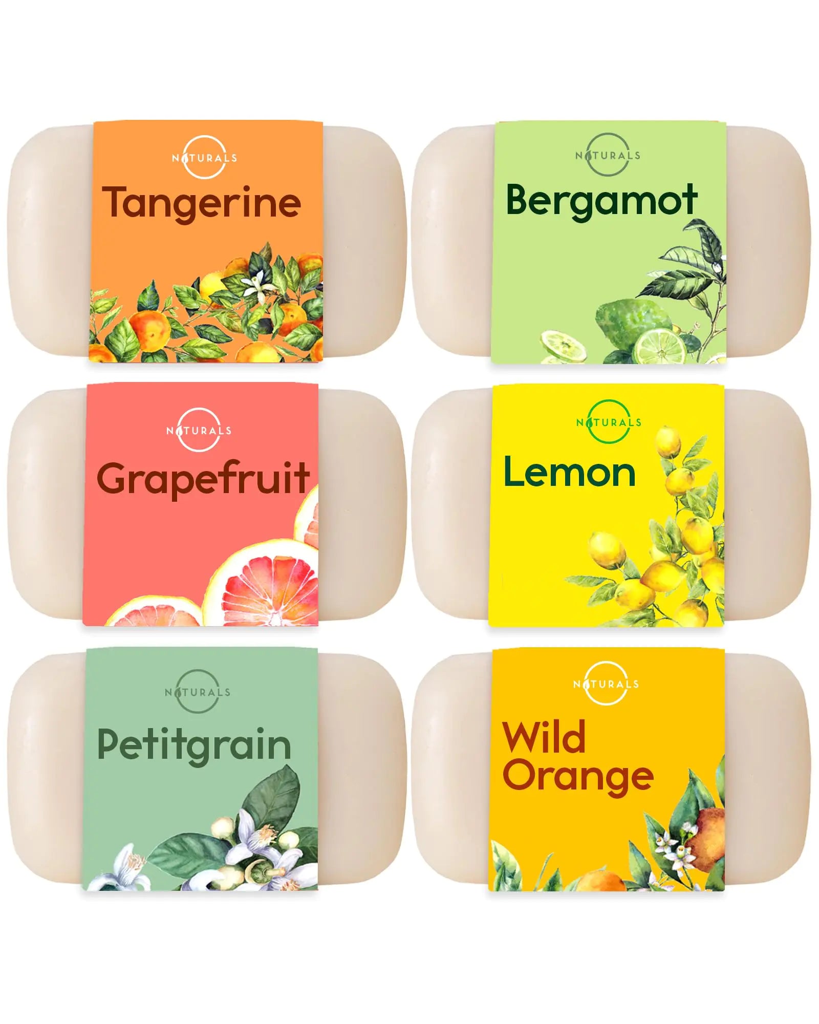 four soap bars with different labels on them