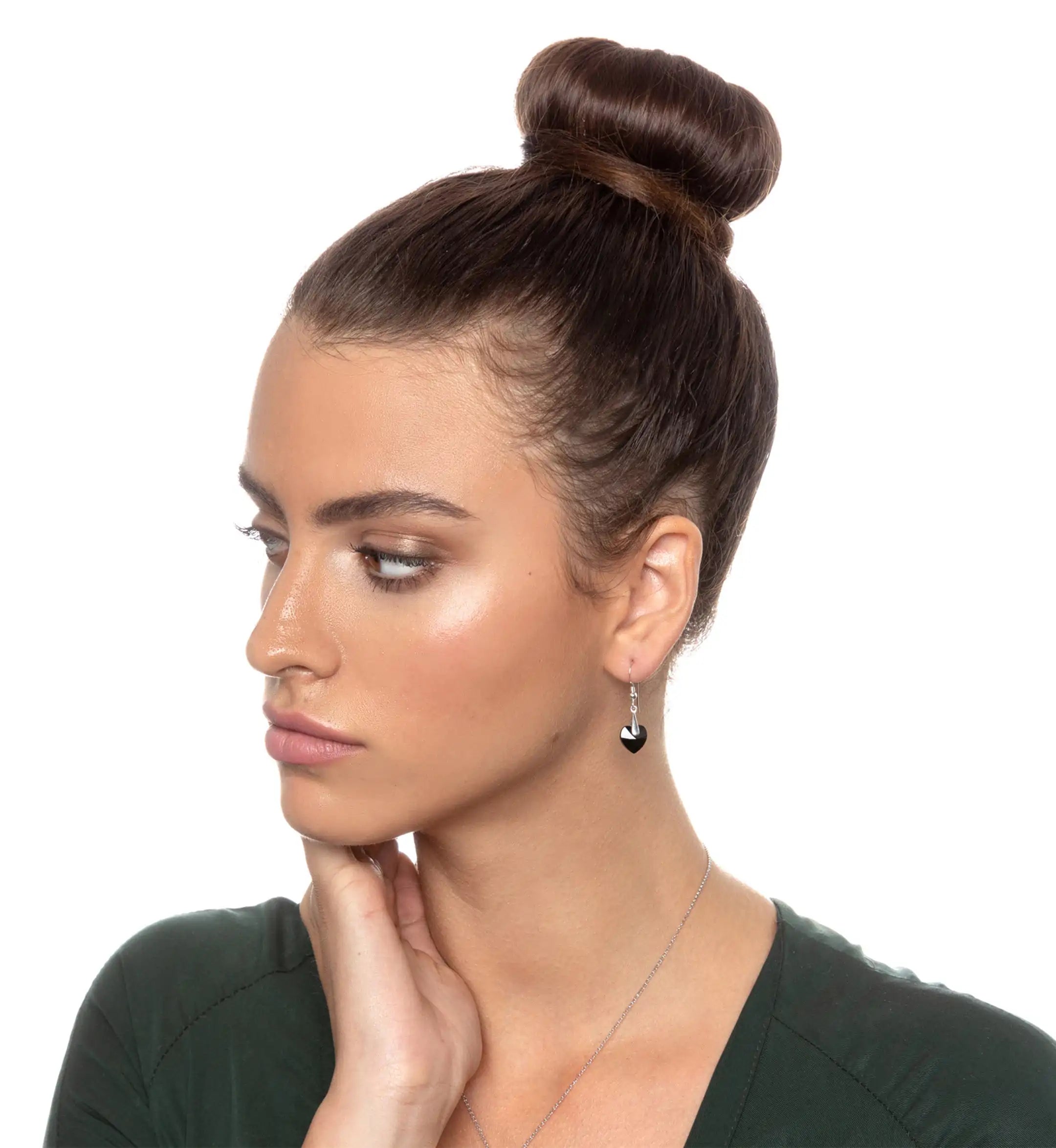 a woman with a bun in her hair