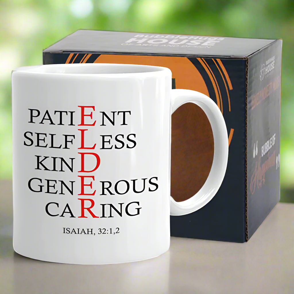A religious coffee mug designed by Blooming Violets featuring the word 'ELDER' prominently displayed, ideal for any day or occasion such as baptism, birthday, or graduation. This inspirational mug celebrates faith with scripture from Isaiah, symbolizing qualities like kindness, generosity, and patience, making it a perfect gift for loved ones and a beautiful decor item for home goods.